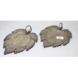 Pair of silver Kashmir Chinar leaf form plates (repairs to handle)