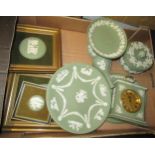 Quantity of Wedgwood green Jasperware porcelain, including wall plaques and a mantel clock