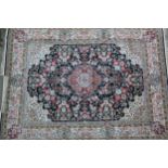 Fine quality modern Persian silk carpet with a lobed medallion and all-over stylised floral design