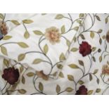 Pair of large good quality all-over floral embroidered curtains on cream ground with linings,