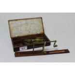 Pair of Late 18th / early 19th Century brass scales, in original mahogany case with some weights and