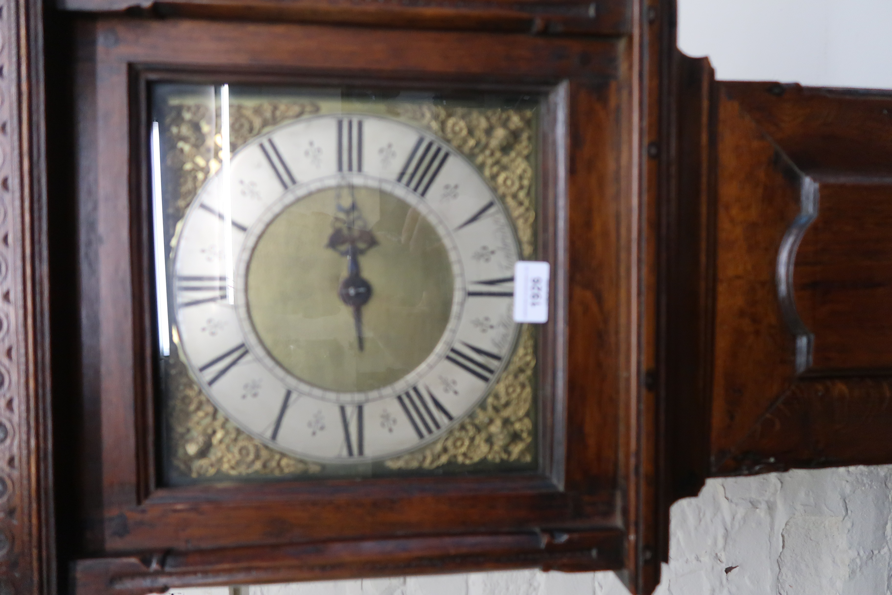 18th Century oak longcase clock with brass dial , silvered chapter ring and Roman numerals, signed