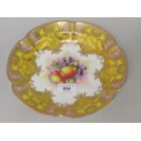 Royal Worcester fruit bowl, painted with fruits, by R. Lewis within a yellow, pink and gilt