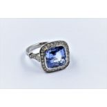 Cornflower blue natural Ceylon sapphire ring, the cushion shaped centre stone of approximately 8.