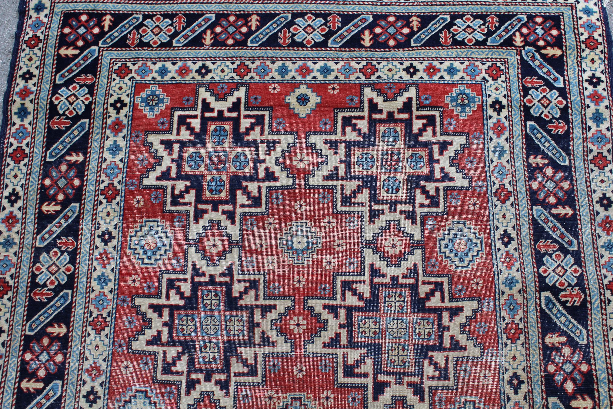 Shirvan rug with eight medallion design on a brick red field with borders, 4ft 10ins x 3ft 8ins - Bild 2 aus 4