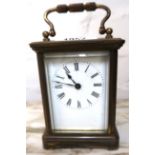 20th Century gilt brass carriage clock, the enamel dial with Roman numerals (crack to dial)