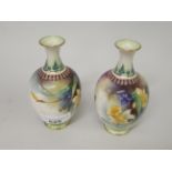 Pair of small Royal Worcester baluster form vases, painted with daffodils and violets, printed marks