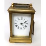 Good quality 20th Century gilt brass cased carriage clock, the enamel dial with Roman numerals