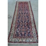 Modern Hamadan runner with an all-over Herati design on a midnight blue ground with borders, 9ft