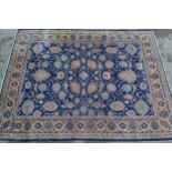 Sparta carpet with an all-over palmette design on a midnight blue ground with borders, 12ft x 9ft