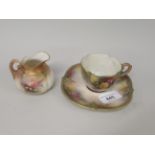 Hadley's Worcester cabinet cup and saucer, painted with roses, together with similar miniature jug