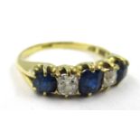 18ct Yellow gold five stone sapphire and diamond half hoop ring, size O 3.5g. Wear to surface of