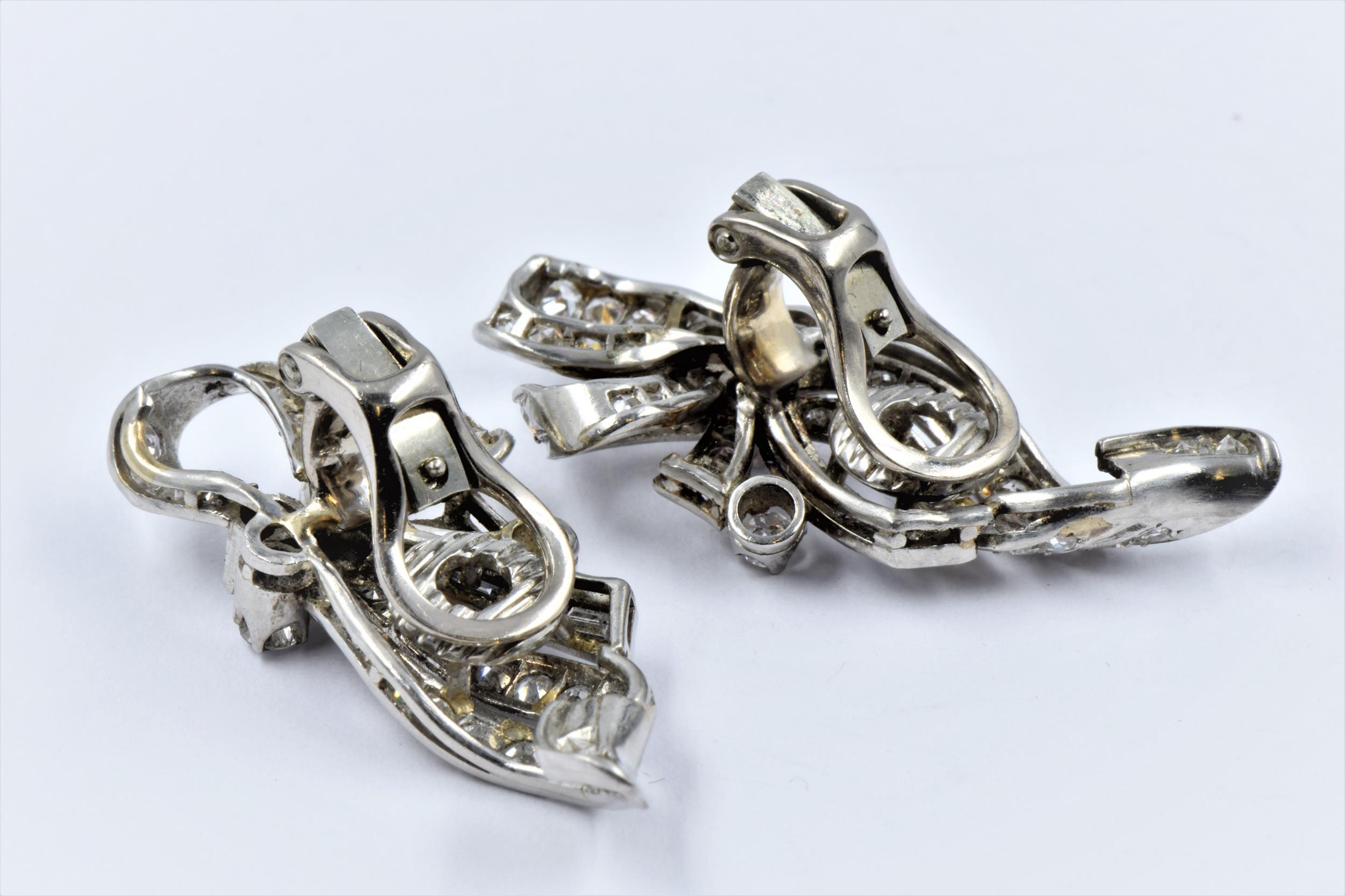 Pair of mid century high carat white metal and diamond set ear clips of Art Deco design, set with - Image 2 of 2