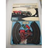 Minic GT miniaturised high speed electric motor racing set, in original box, Jaguar E-type and Aston