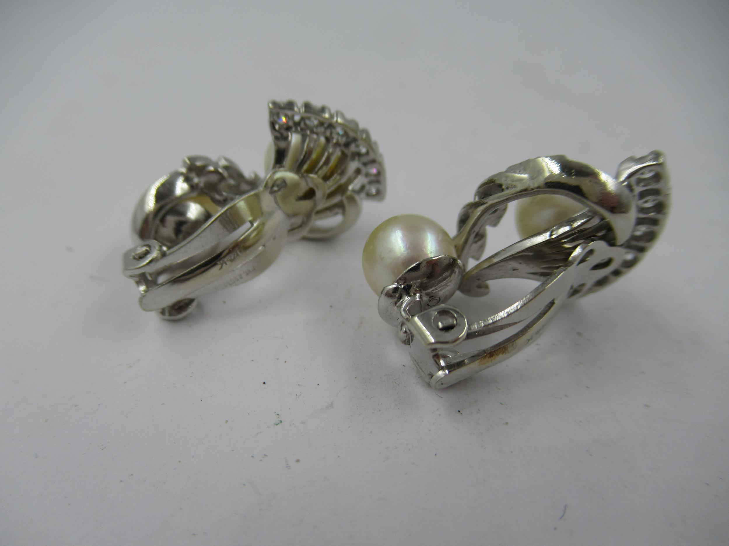 Pair of 14ct white gold cultured pearl and diamond set clip earrings of stylised floral design, - Image 2 of 3