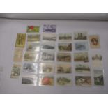 Collection of twenty-eight ' Hold To Light ', postcards