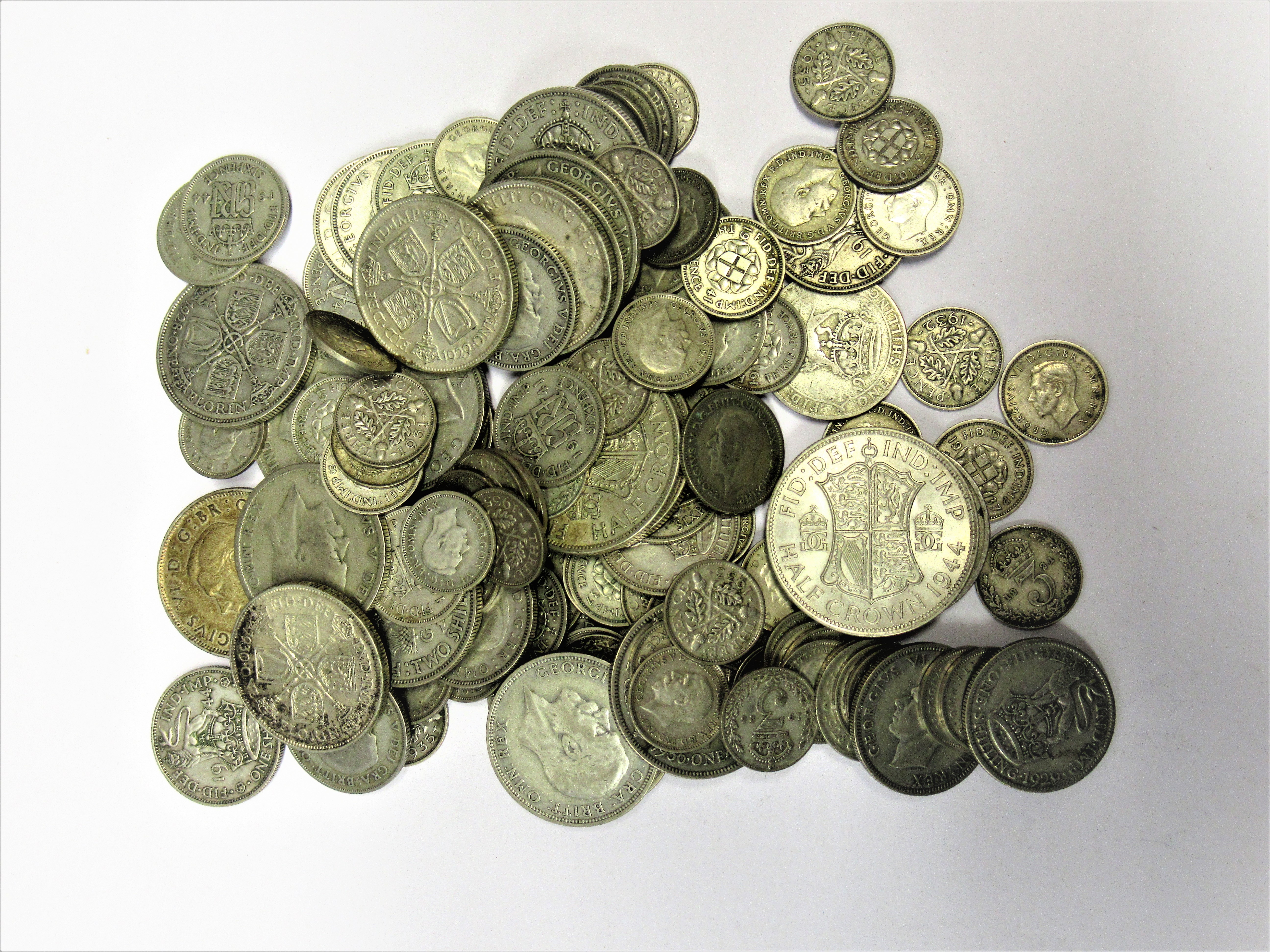 Bag containing a quantity of pre 1947 mainly British silver coinage