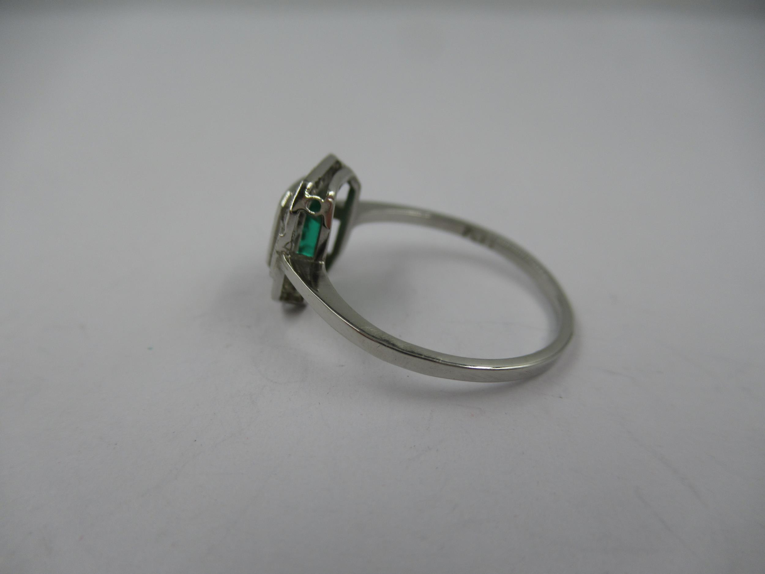 Platinum ring set with central octagonal emerald surrounded by diamonds, size N 2.9g Dimensions of - Image 2 of 5