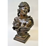 Albert Darcq, brown patinated bronze bust of a girl, signed on the platform base, 18ins high