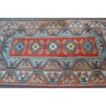 Modern Turkish rug with a central panel design and double border