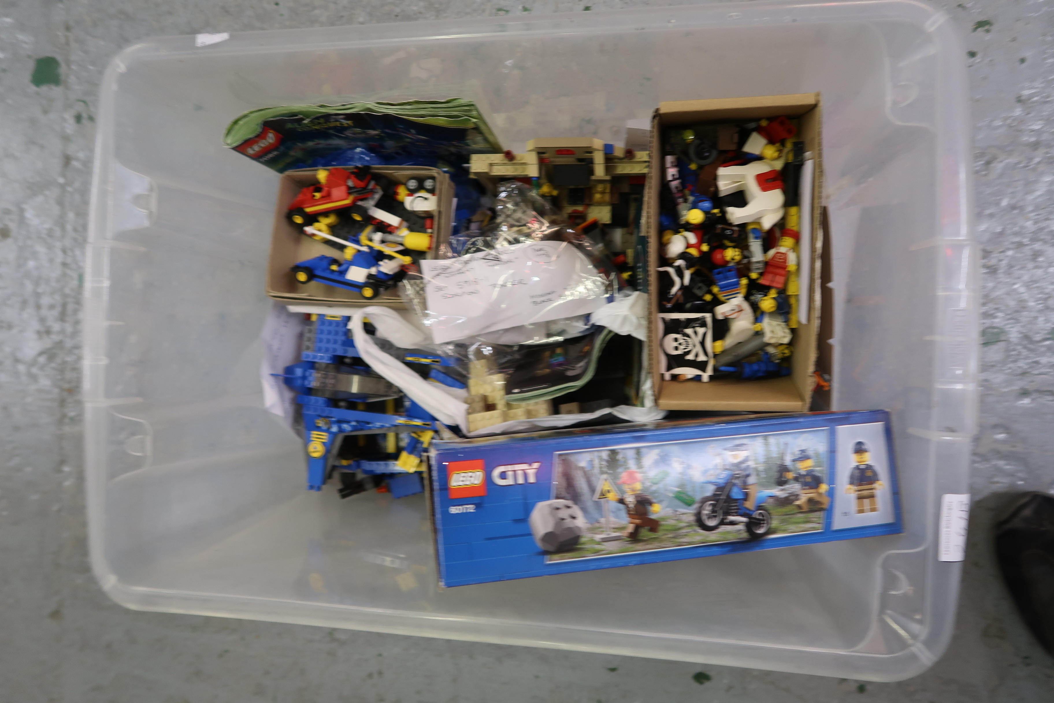 Box of Lego part sets