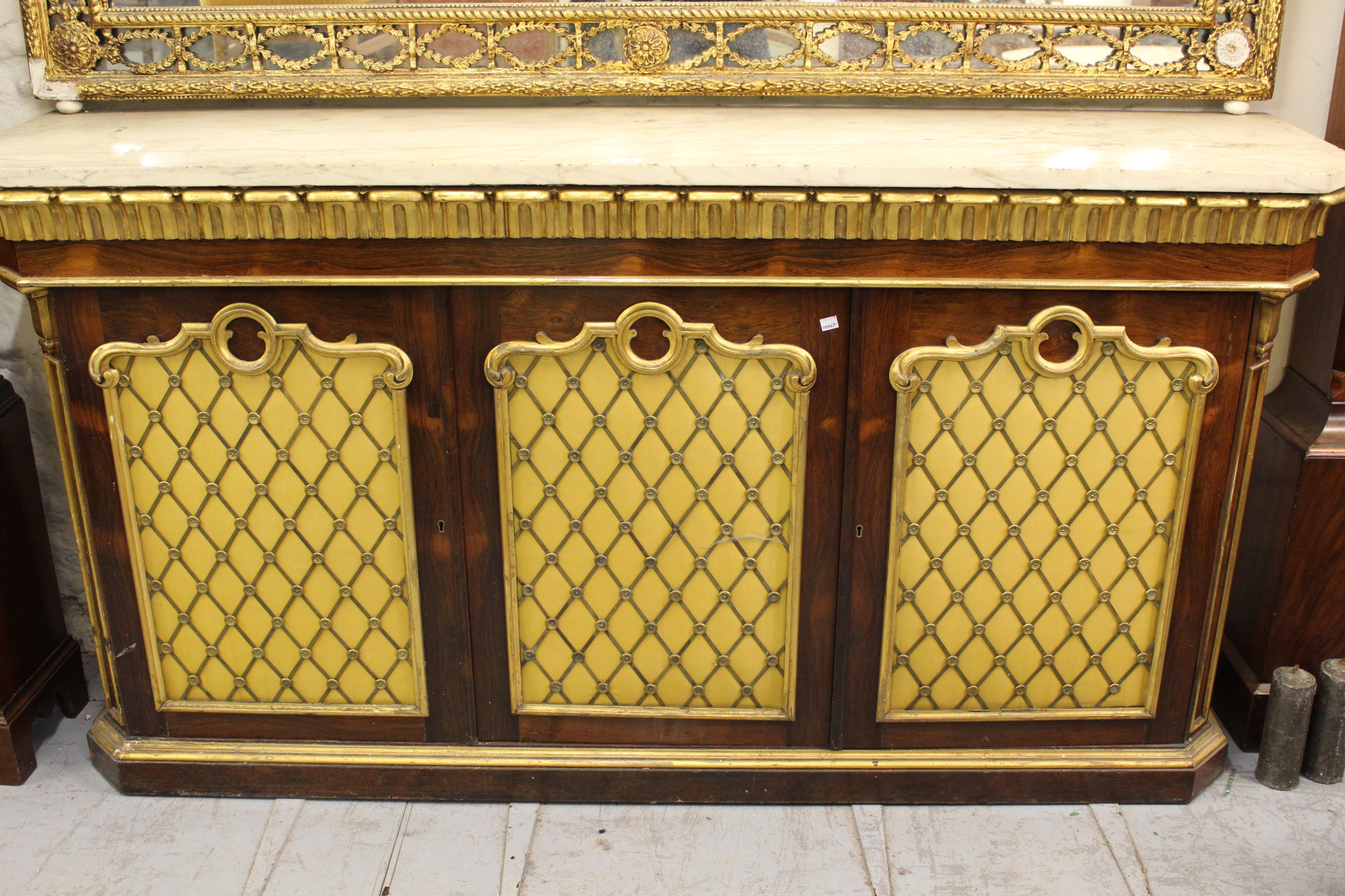 19th Century rosewood and parcel gilt side cabinet in Regency style, the marble top above a