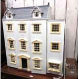 Large pale blue painted wooden dolls house in Georgian style, 87cm high x 82cm wide x 32cm deep