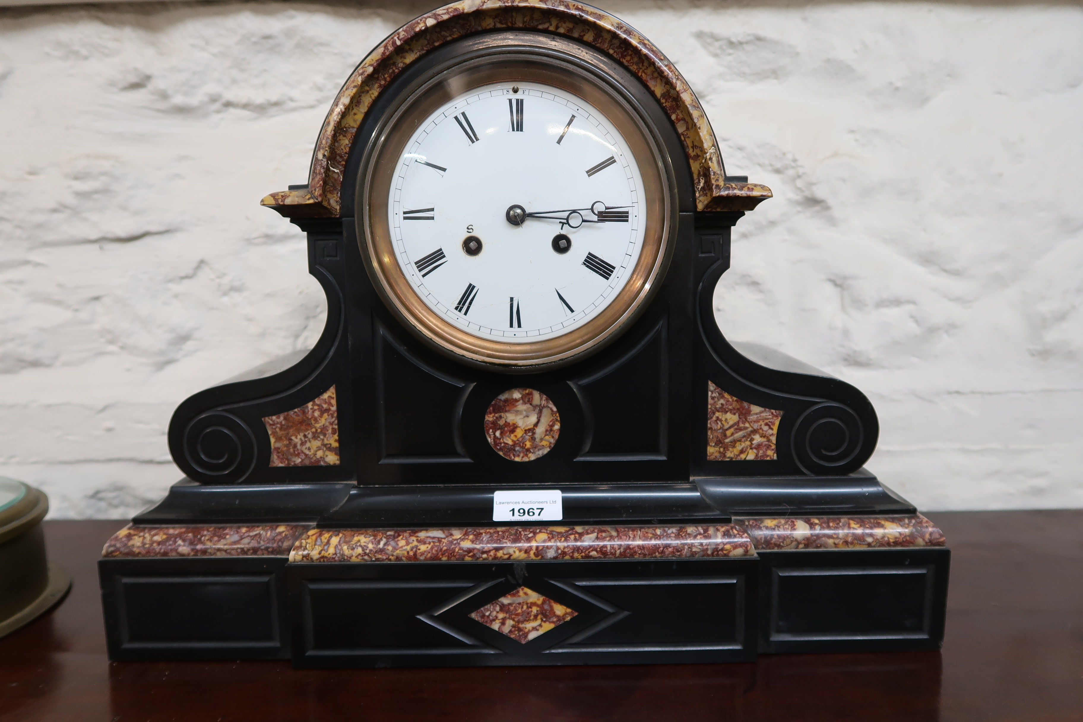 Large 19th Century French black slate and rouge marble mantel clock, the enamel dial with Roman