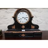 Large 19th Century French black slate and rouge marble mantel clock, the enamel dial with Roman