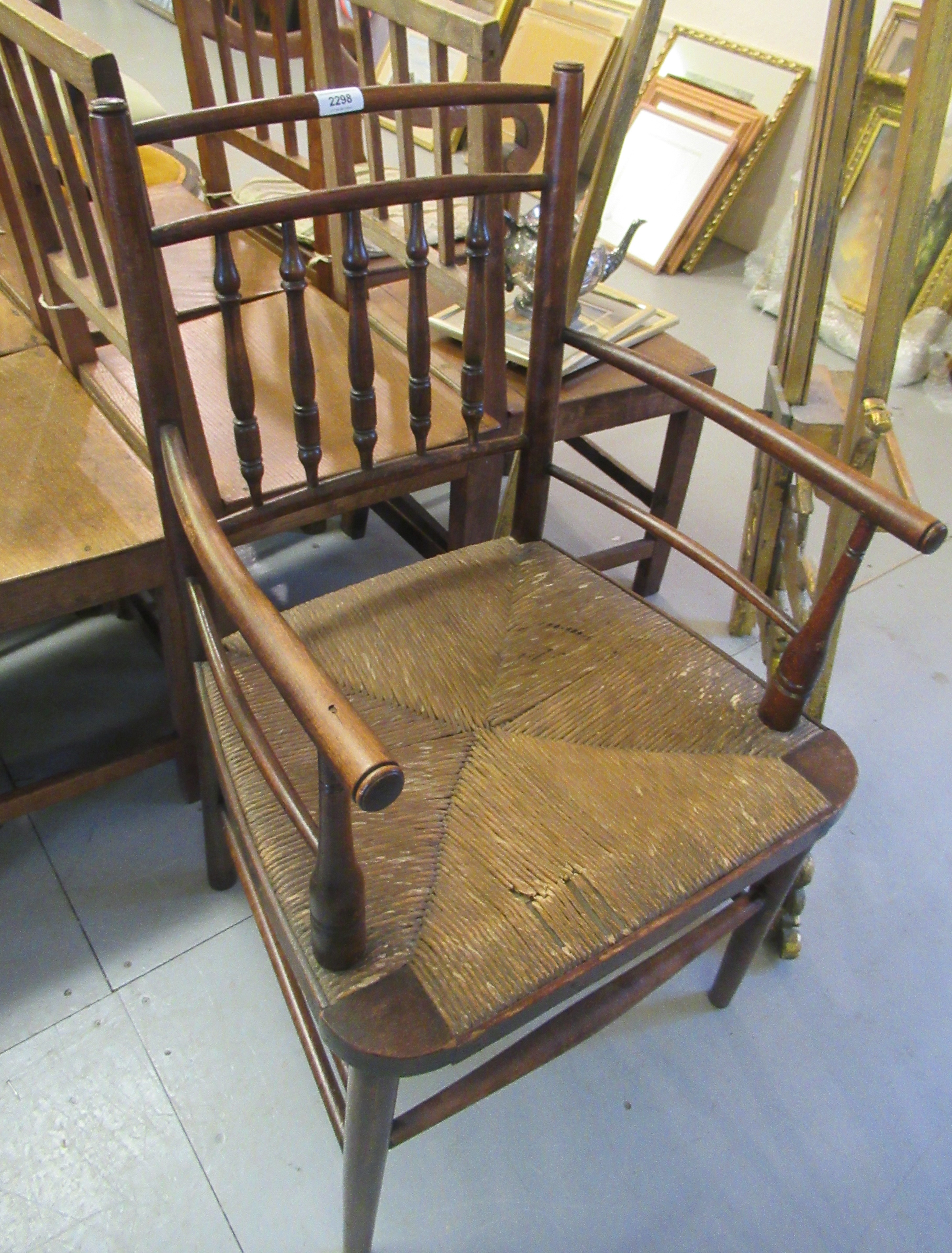 Morris & Co. Sussex chair with spindle back, rush seat and turned supports