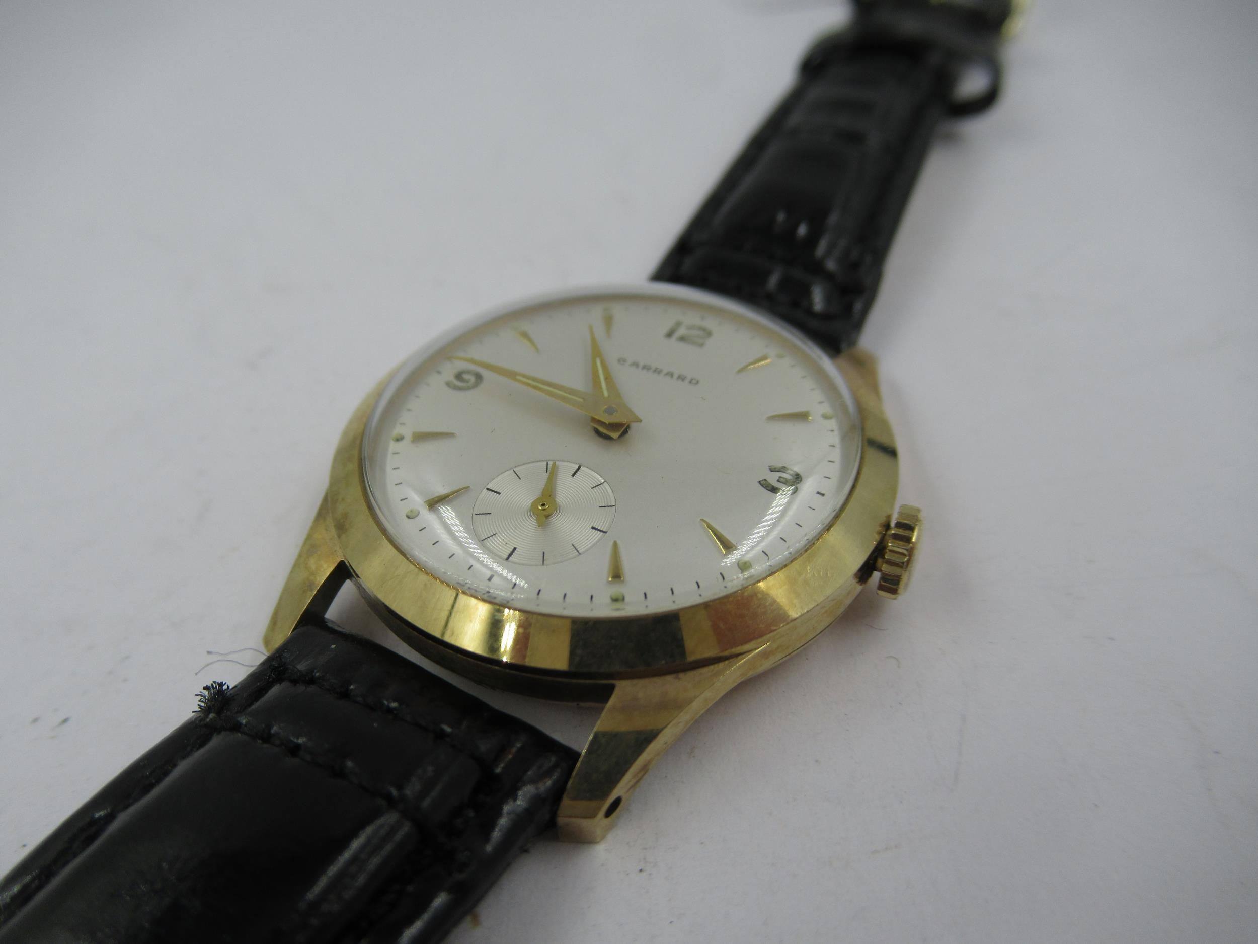 Gentleman's 9ct gold cased wristwatch by Garrards, the silvered dial with Arabic and baton numerals, - Image 2 of 4