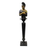 Painted plaster bust of a semi nude classical female mounted on an ebonised column support, 67ins