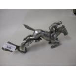 Car mascot in the form of a horse and rider with chrome plated finish, marked Desmo