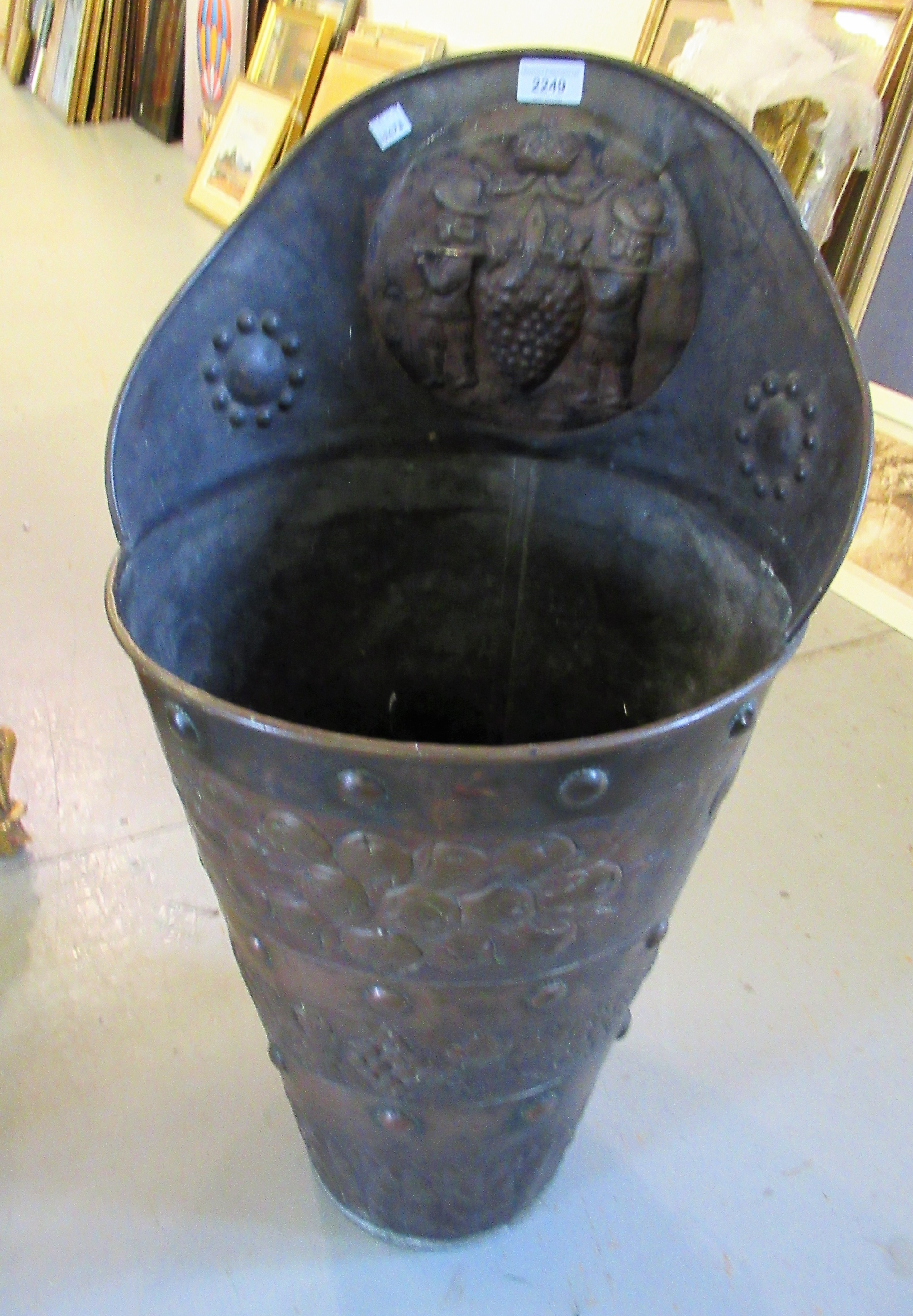 Late 19th / early 20th Century embossed copper grape hod, 30ins high