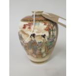 Small Satsuma baluster form vase, decorated with two panels of figures and flowers with signature to
