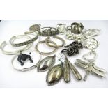 Quantity of various silver pendants, brooches, bangles and earrings, 5.7 troy oz.