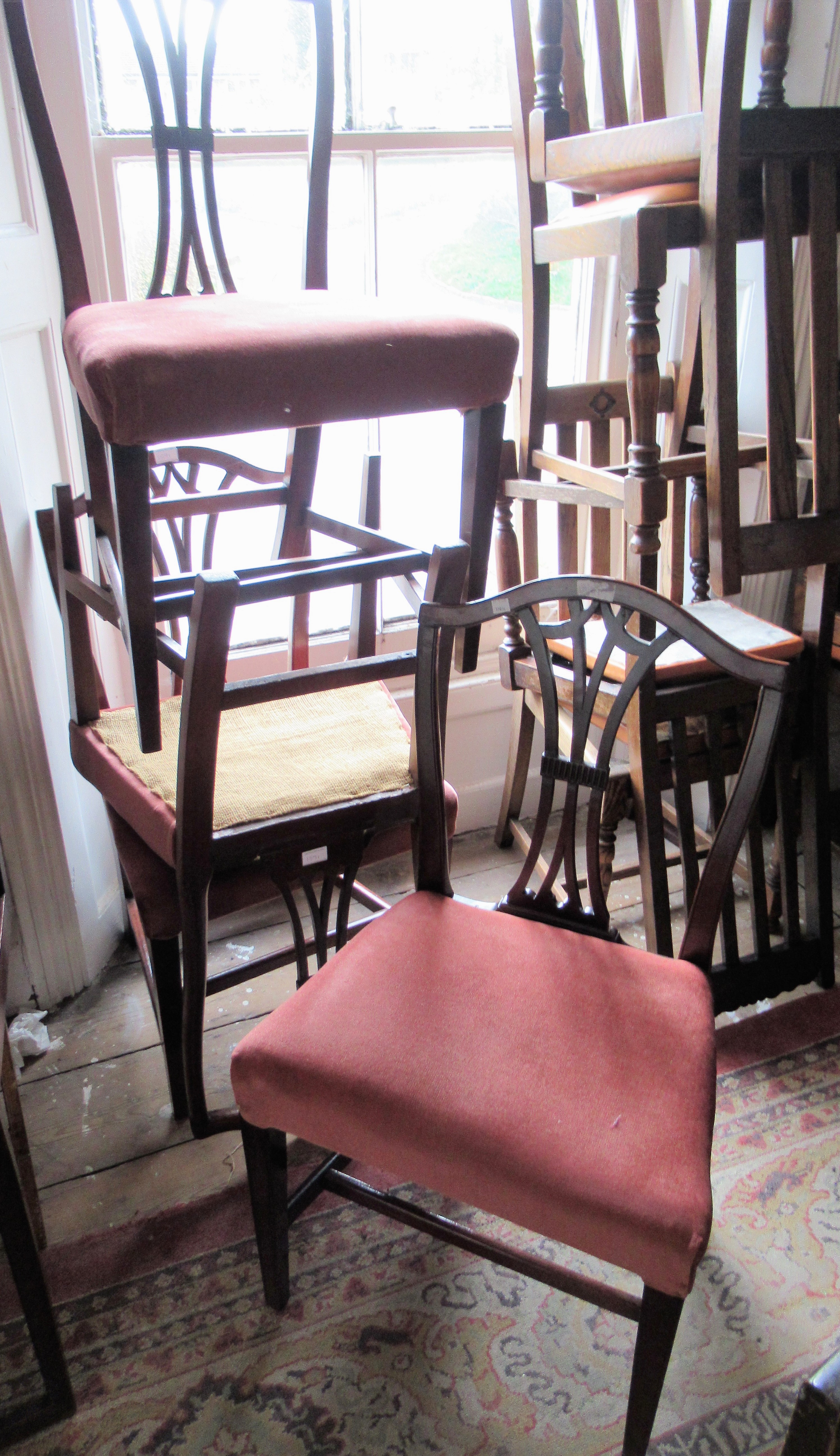 Set of four 19th Century mahogany shield back chairs (some damages), together with a ladderback