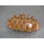 19th Century Brampton type salt glazed four division toast rack, 8.5ins wide