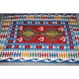 Kelim rug having red, blue and cream ground and another similar, smaller, 160 x 110cms and 120 x