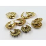 Four pairs of 9ct gold Etruscan style earrings, 11.5g, together with a similar unmarked pair of