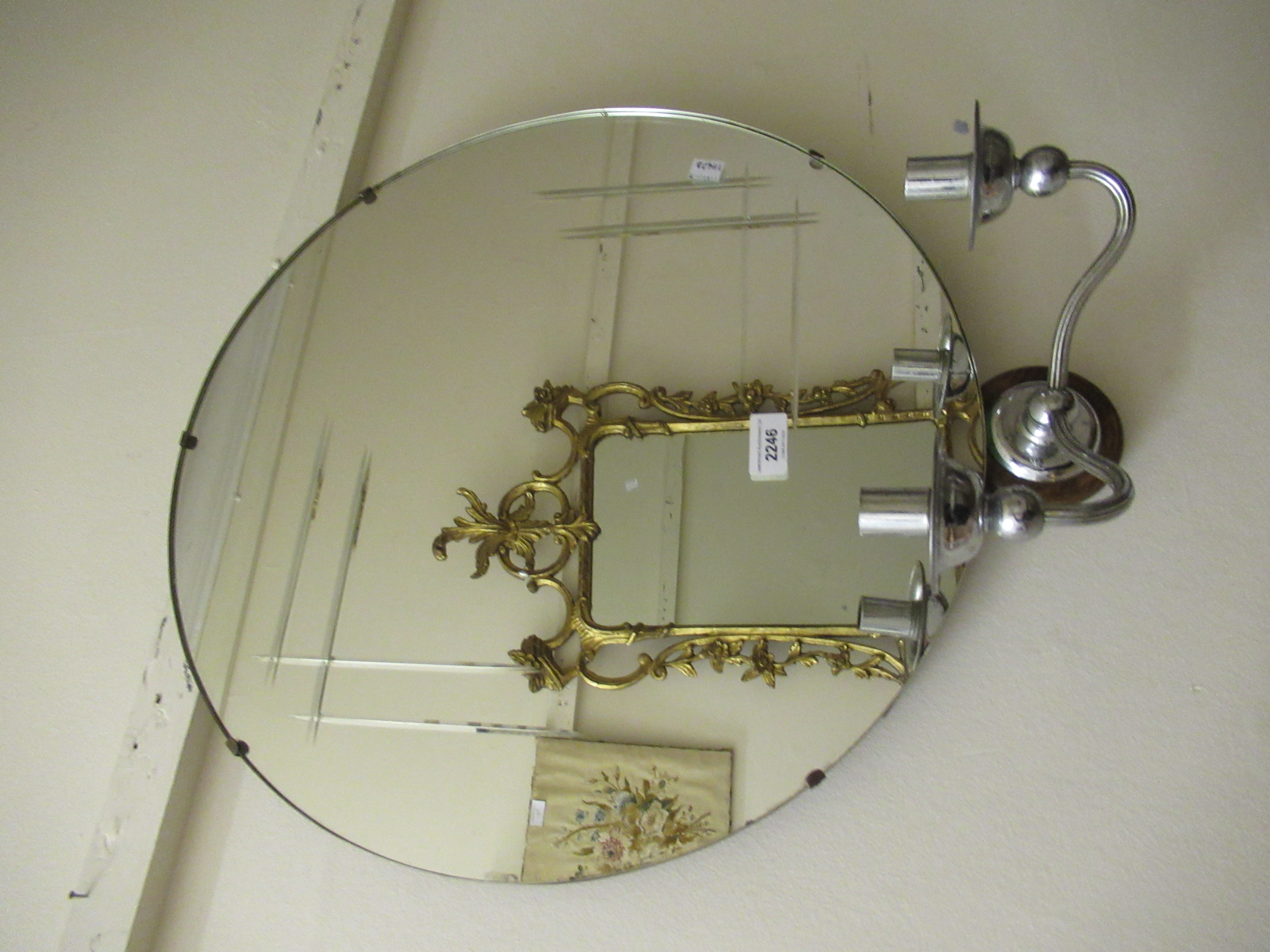 Art Deco circular engraved wall mirror with twin branch chrome candle holders, 20ins diameter