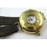 Longines, circular 18ct gold cased hunter type wristwatch It has multiple cracks and chips to the