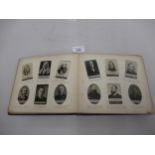 Ogdens new Century Album containing set of famous persons cigarette cards