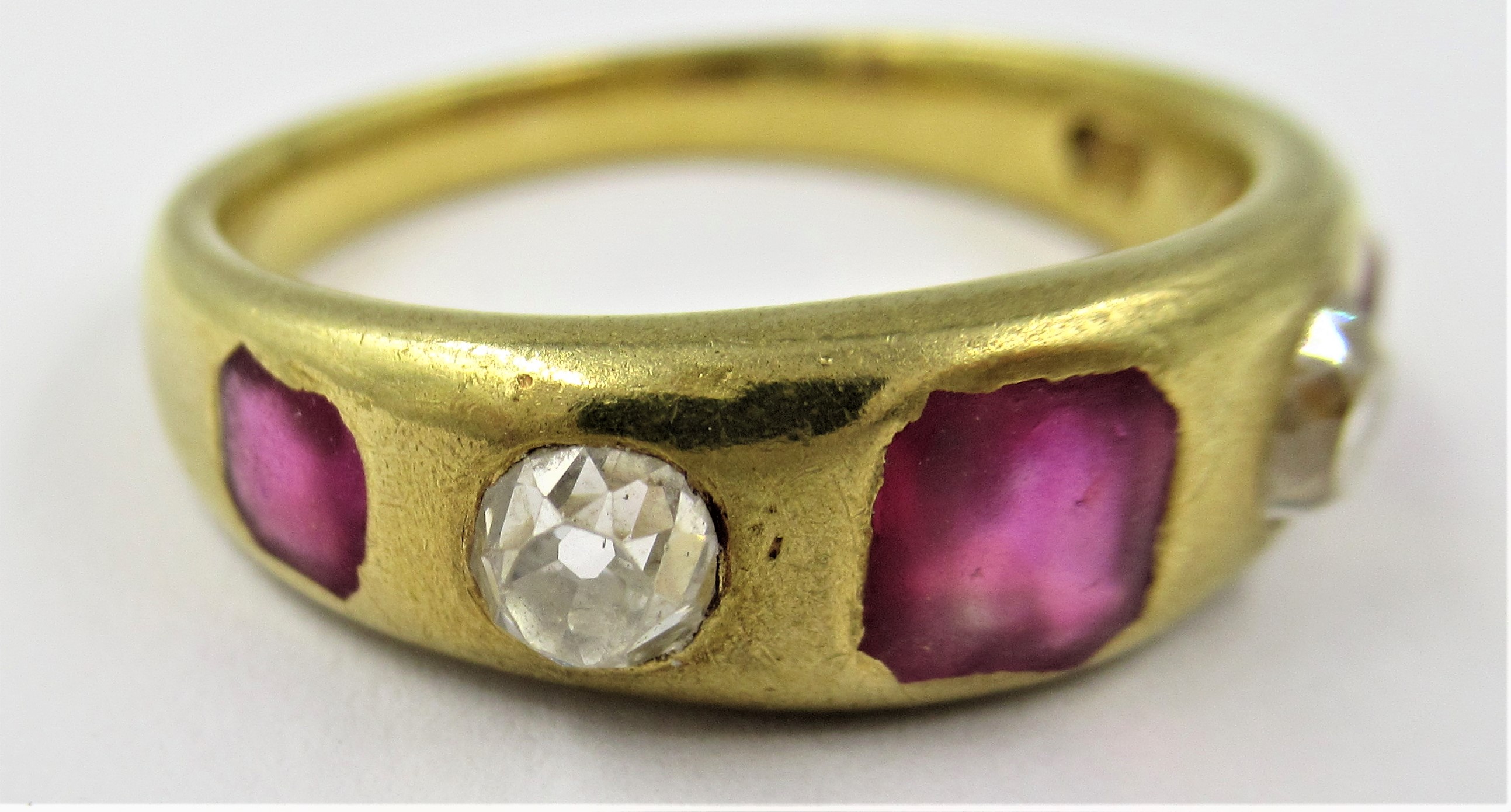 19th Century gold five stone ruby and diamond set gypsy ring, 6g, size 'K.5' Only marked JL. Some