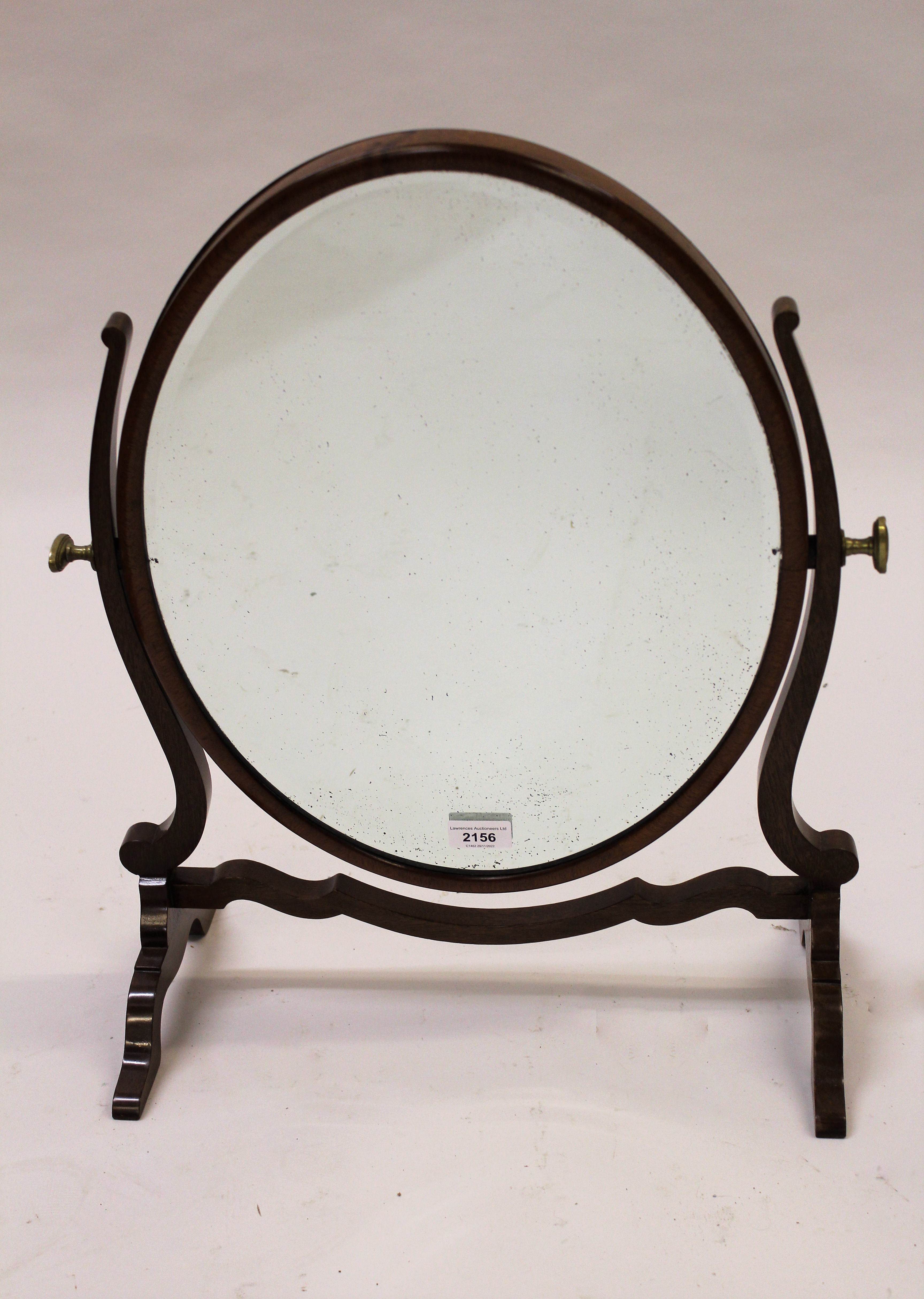 Mahogany swing frame toilet mirror on shaped supports