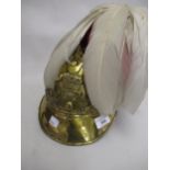 Late 19th / early 20th Century French brass helmet inscribed ' Sapeurs Pompiers Islenen Dodon ' with