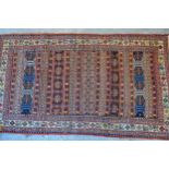 Small Soumak mat with a polychrome banded design, 3ft 5ins x 2ft approximately, together with two