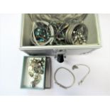 Silver heart shaped pendant on chain, another silver chain, a silver bangle and a quantity of