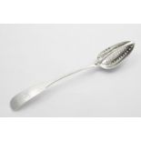 A GEORGE III IRISH FIDDLE PATTERN DIVIDER SPOON basting size with a removable strainer, by Richard