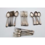 A LATE VICTORIAN PART SERVICE OF OLD ENGLISH PATTERN FLATWARE:- Six table spoons, six table forks,